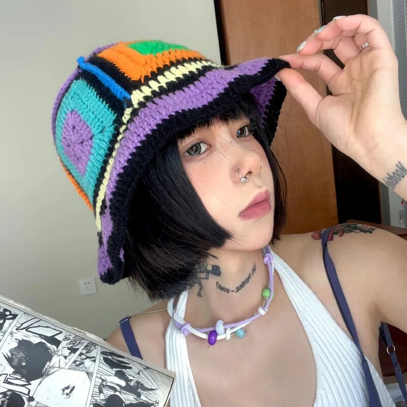 A girl wearing a Rainbow Crocheted Bucket Hat
